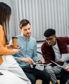 multicultural-young-businesspeople-discussing-new-business-idea-in-office.jpg multicultural-young-businesspeople-discussing-new-business-idea-in-office.jpg